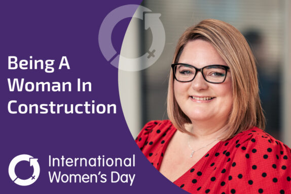 IWD product analyst Rebecca Partridge in a red top with a purple frame on the image.